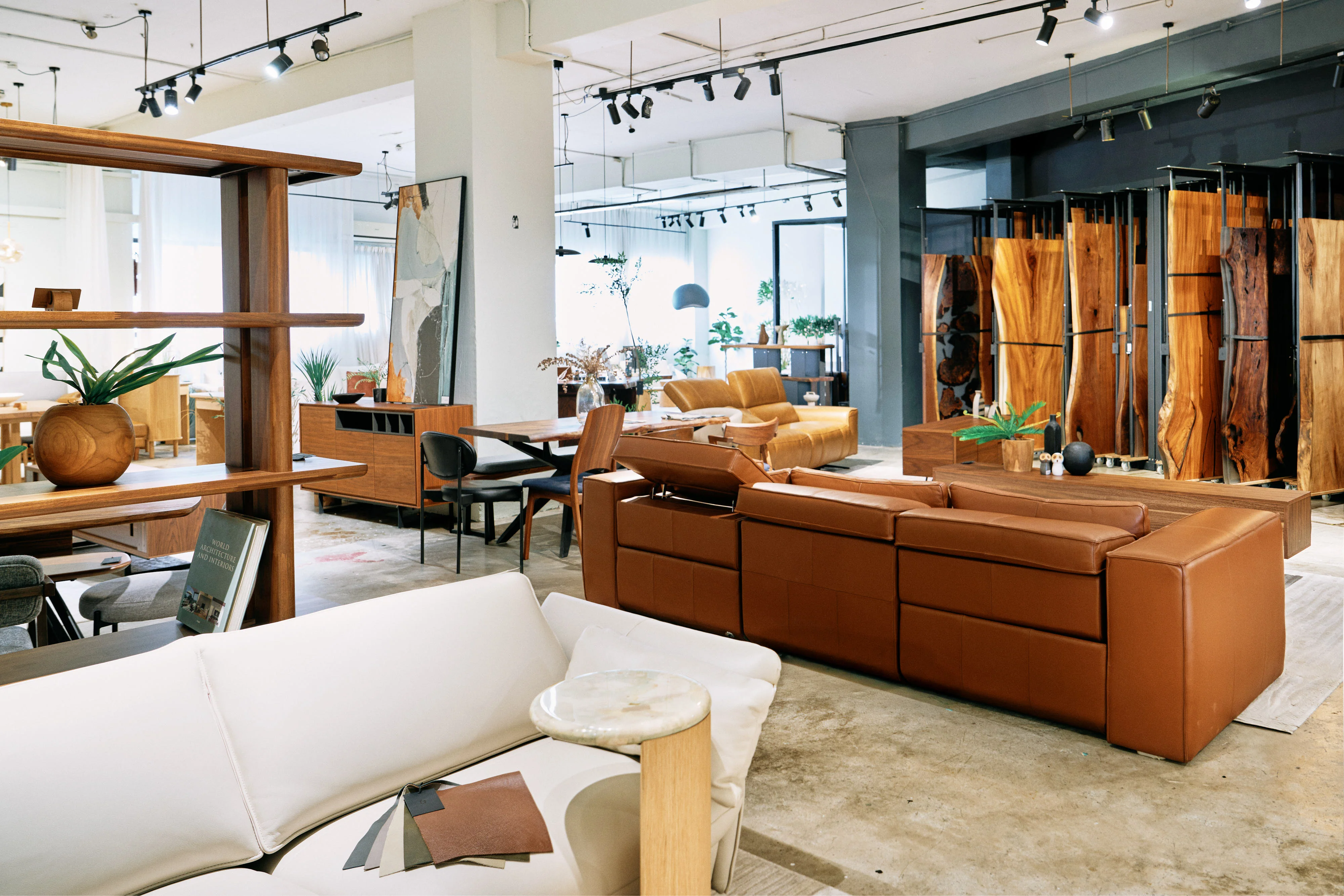 Interior designer presenting furniture materials and styling ideas to a small group