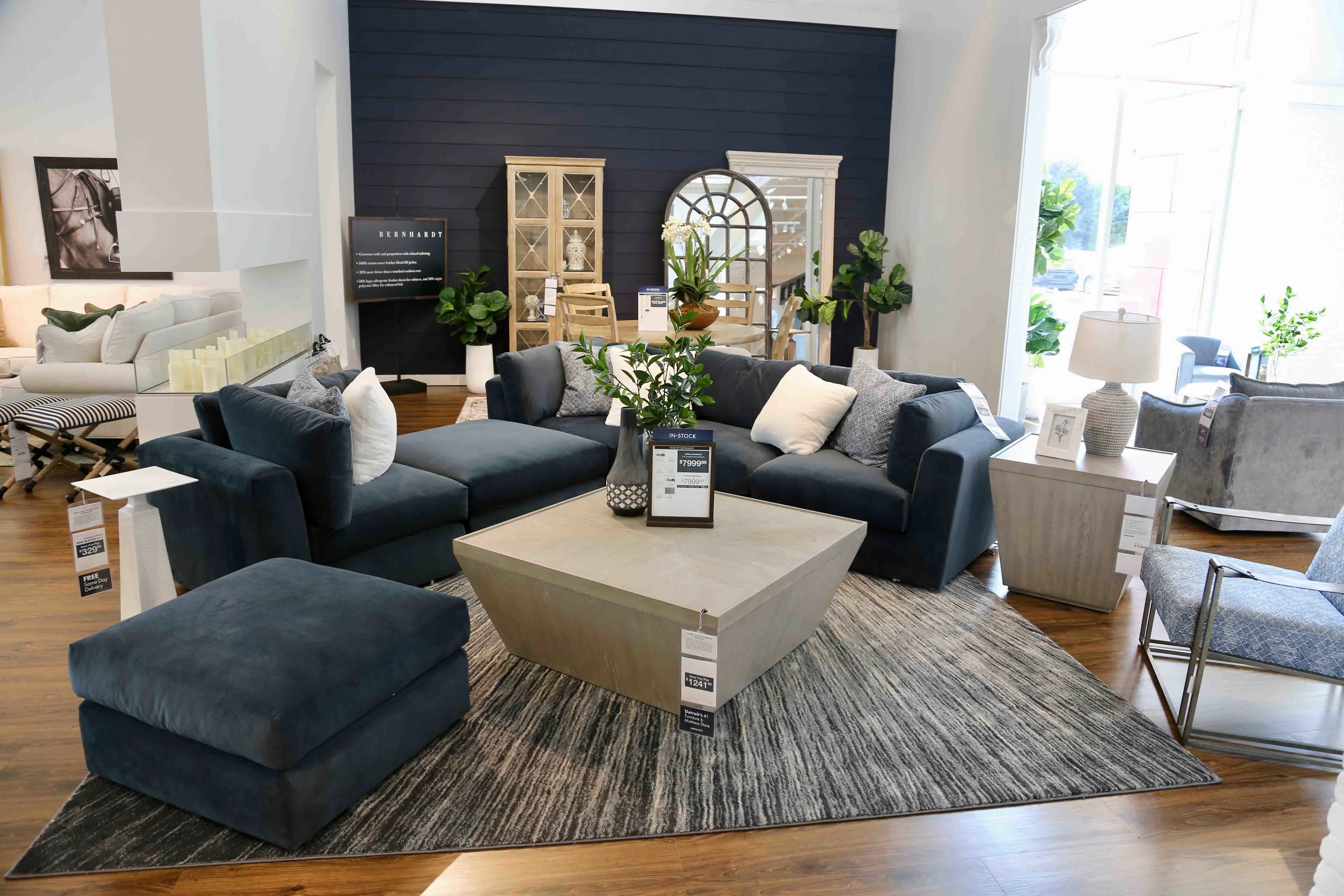 Contemporary furniture showroom with sofas, tables and coordinated living room pieces